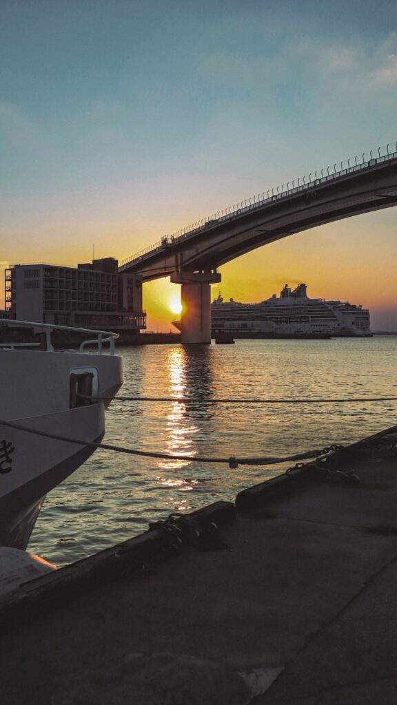 Sunset over Naha harbour and skyline in Okinawa, Japan
