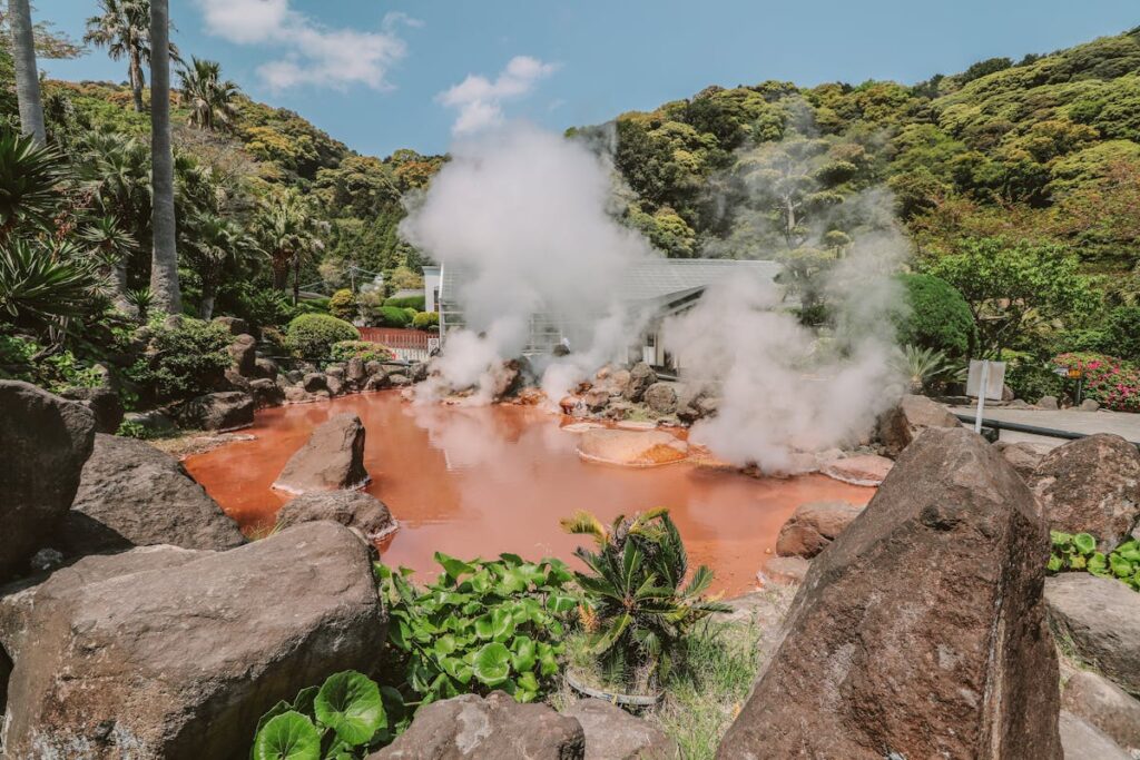 Steam rising from Japanese hot springs at Kusatsu Onsen