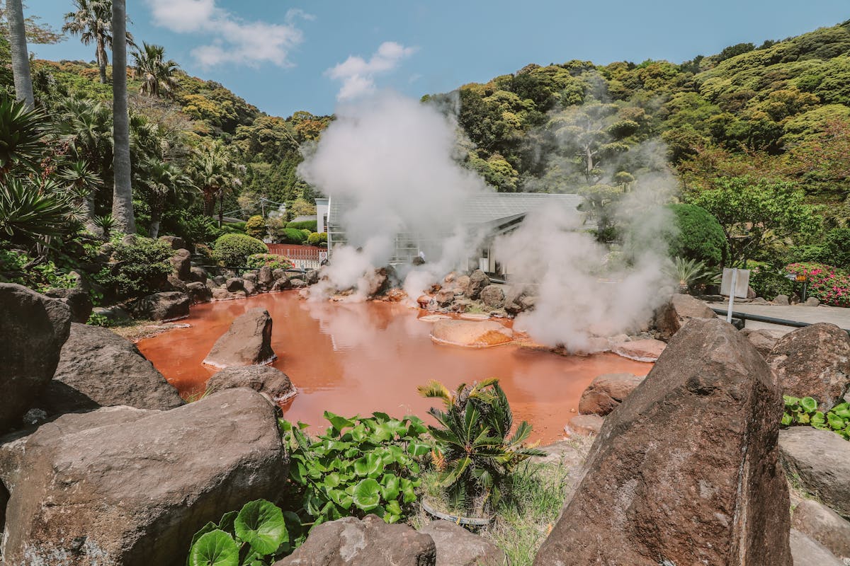 Steam rising from Japanese hot springs at Kusatsu Onsen