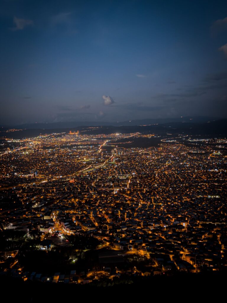 Brightly lit cityscape at night, like the famous Mt. Hakodate night view