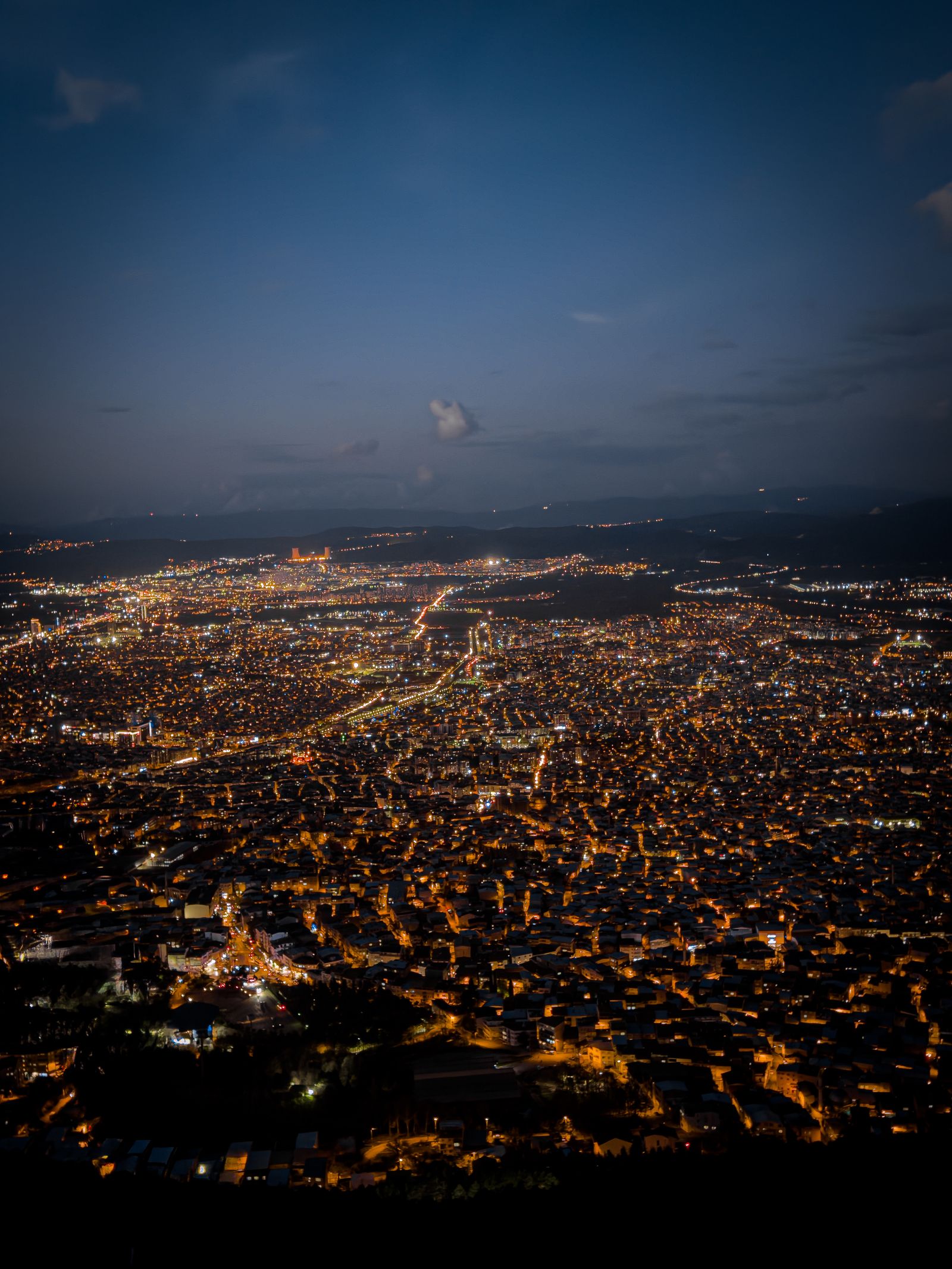 Brightly lit cityscape at night, like the famous Mt. Hakodate night view