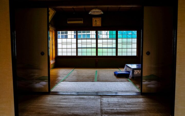 A traditional Japanese ryokan room with tatami floors