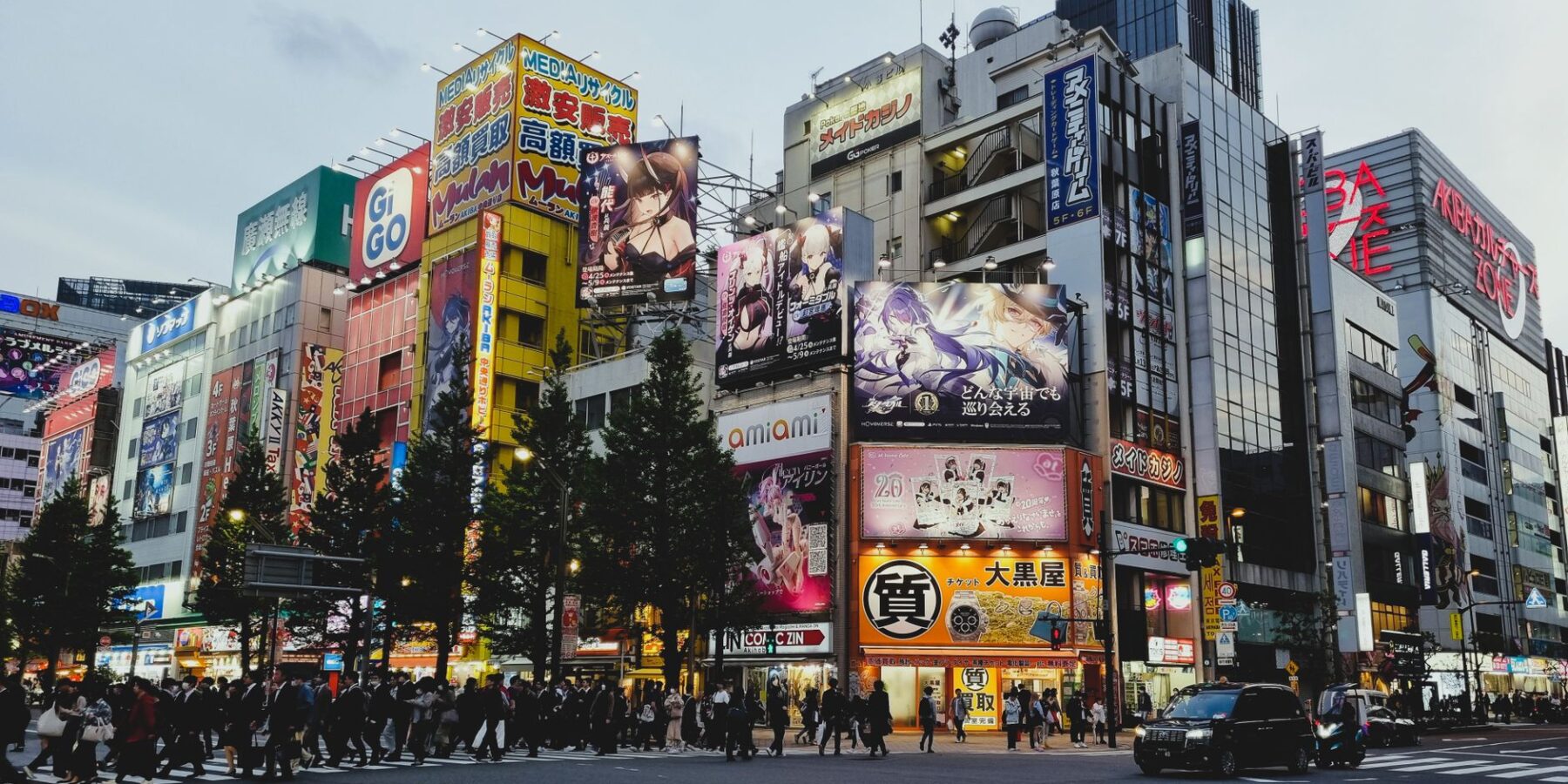 Anime billboards and electronics stores at an Akihabara crossing, Tokyo