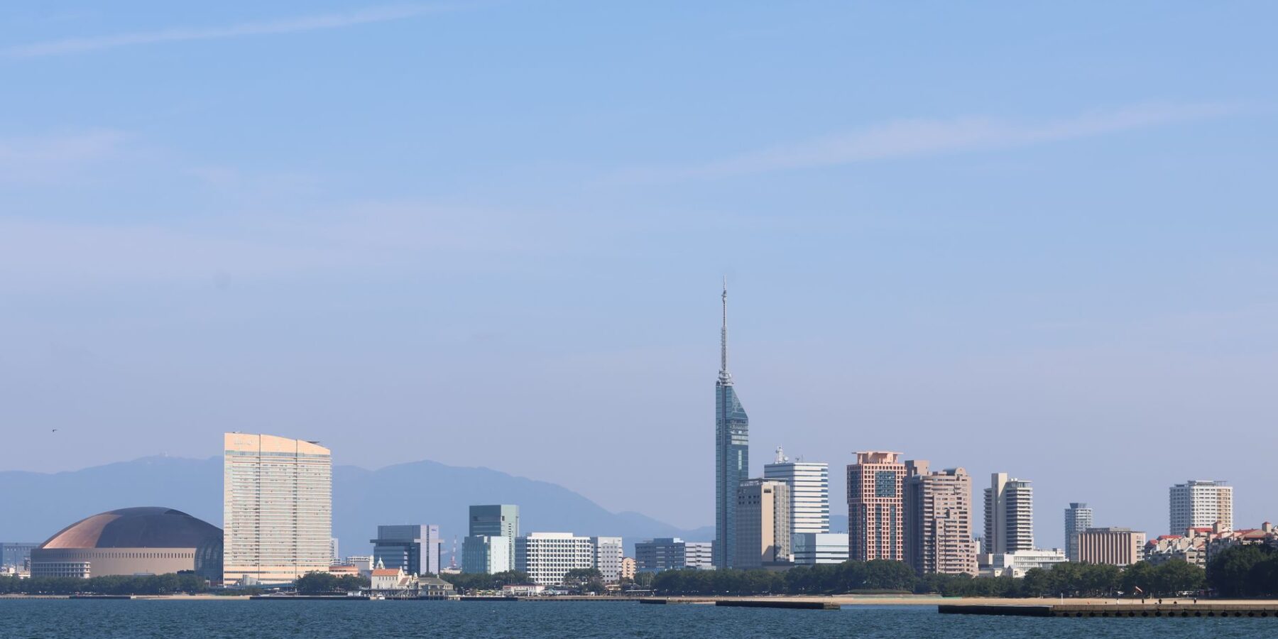 Fukuoka city skyline with Fukuoka Tower across Hakata Bay, Japan