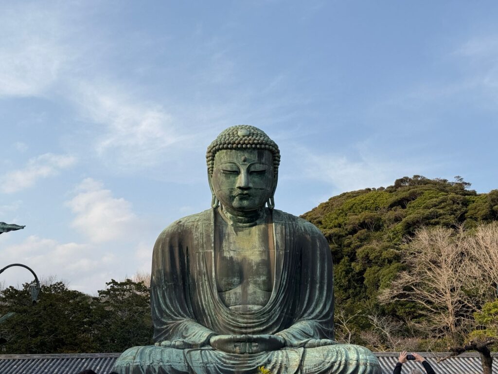 The Great Buddha of Kamakura at Kotoku-in Temple under a clear blue sky