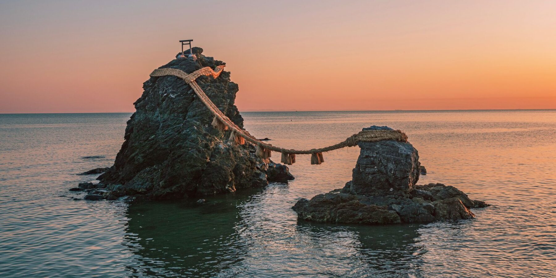 Meoto Iwa wedded rocks joined by a sacred rope at dawn, Futami, Mie