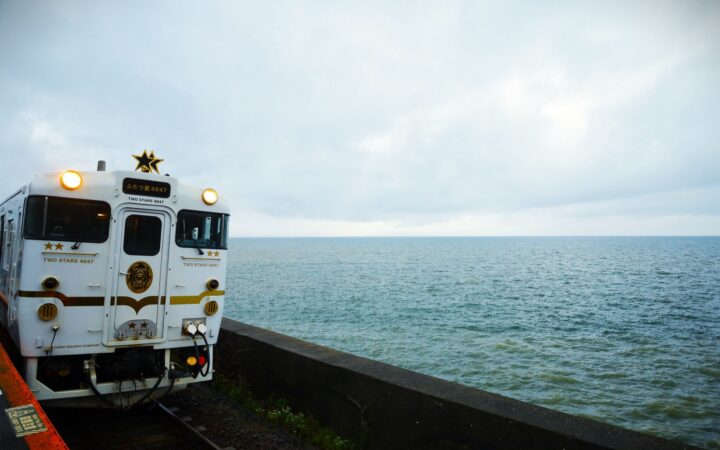 Train running along the Omura Bay shoreline in Higashisonogi, Nagasaki Prefecture