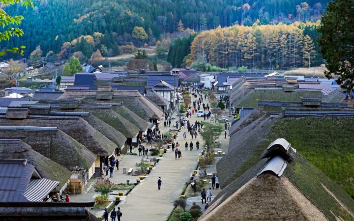 Thatched-roof houses lining the main street of Ouchijuku post town in Fukushima in autumn