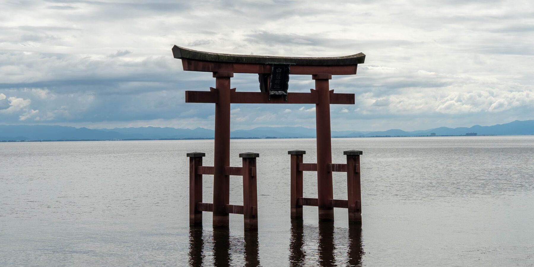 Shirahige Shrine torii gate standing in Lake Biwa, Shiga, Japan