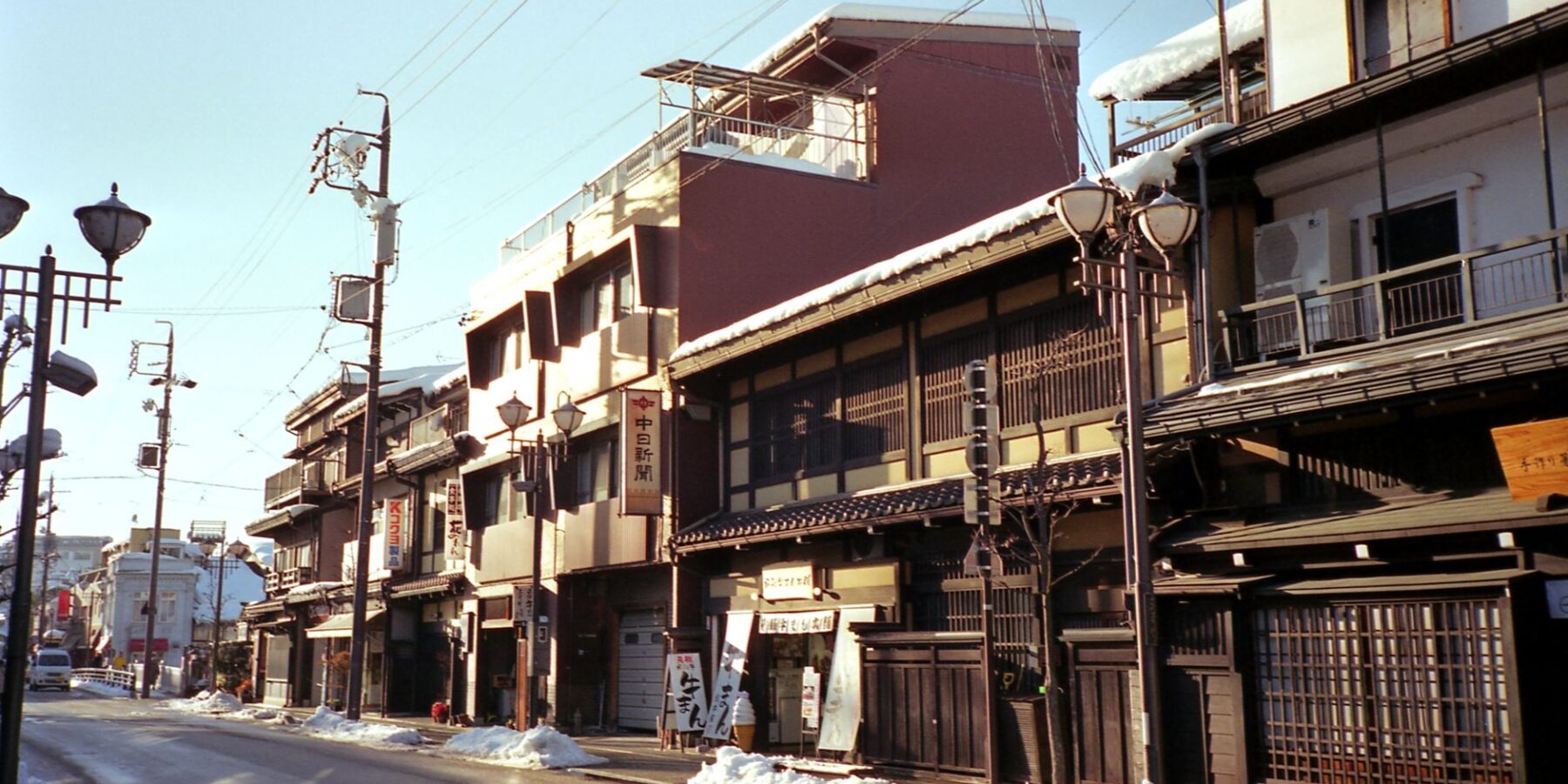 Traditional wooden merchant houses on a historic street in Takayama, Gifu, Japan