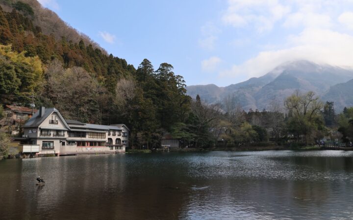 Lake Kinrinko and inn buildings below Mount Yufu, Yufuin, Oita